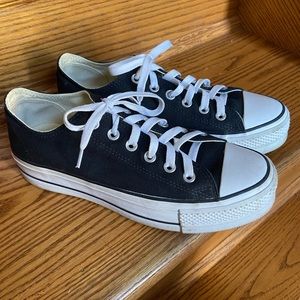 Short black platform Converse in a size 8. Only worn a few times.